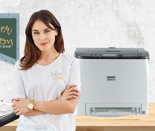 women standing by printer